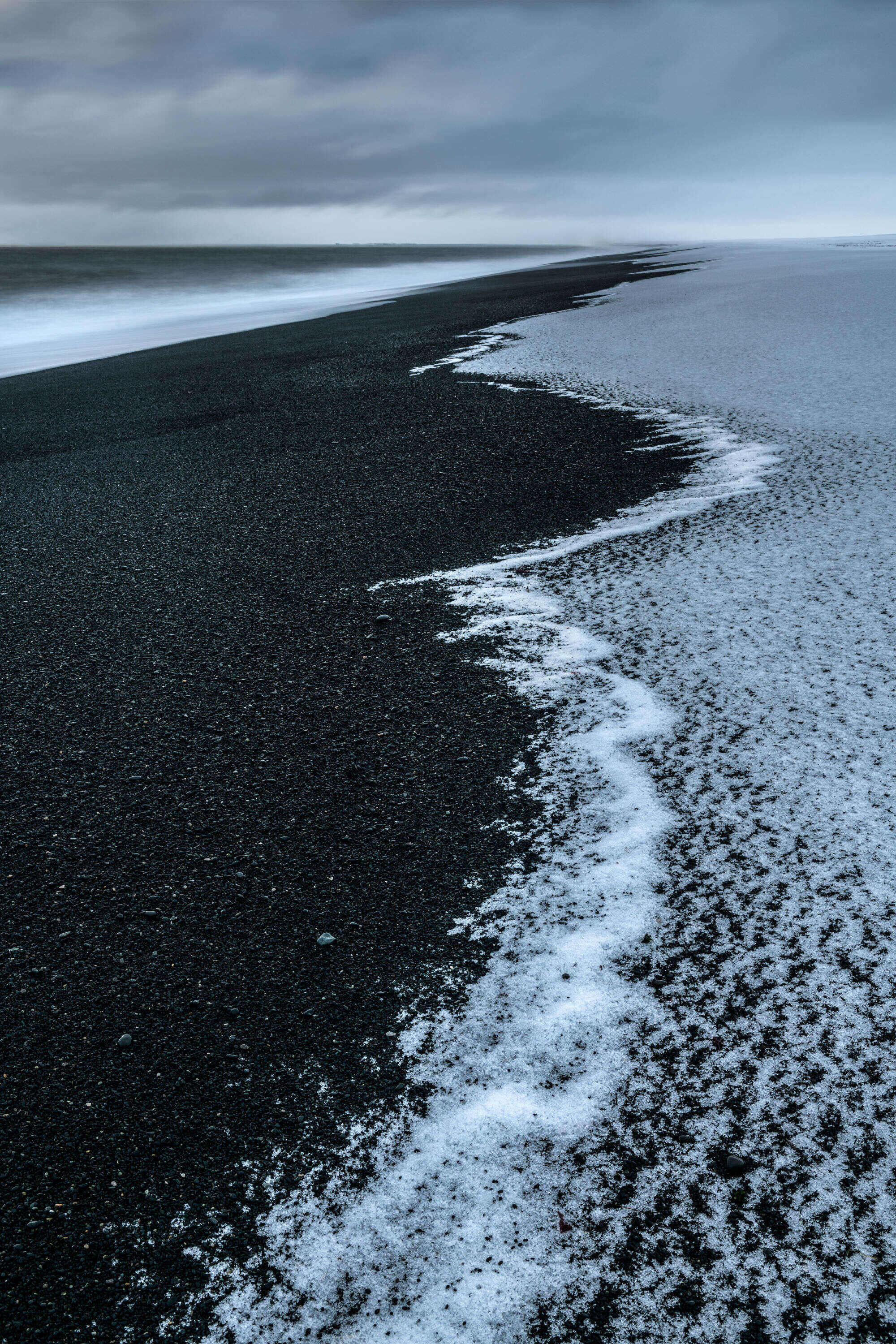 Snow on Black Sands Iceland by Paul Gallagher aspect2i